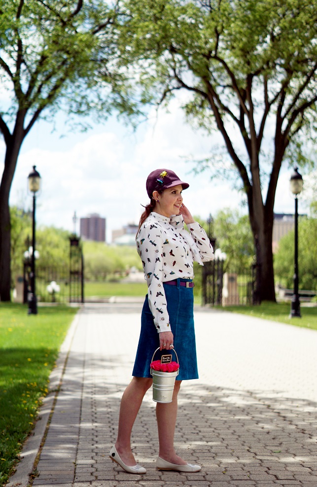 Winnipeg Style fashion stylist, Loly in the sky Hello Love Tamara flats, Chicwish Nature buddies bug critter bow chiffon top, Rose colored glasses rose pail Paint the town rose bag handbag, Danier Leather blue suede skirt, Banana republic bug beetle brooch earrings